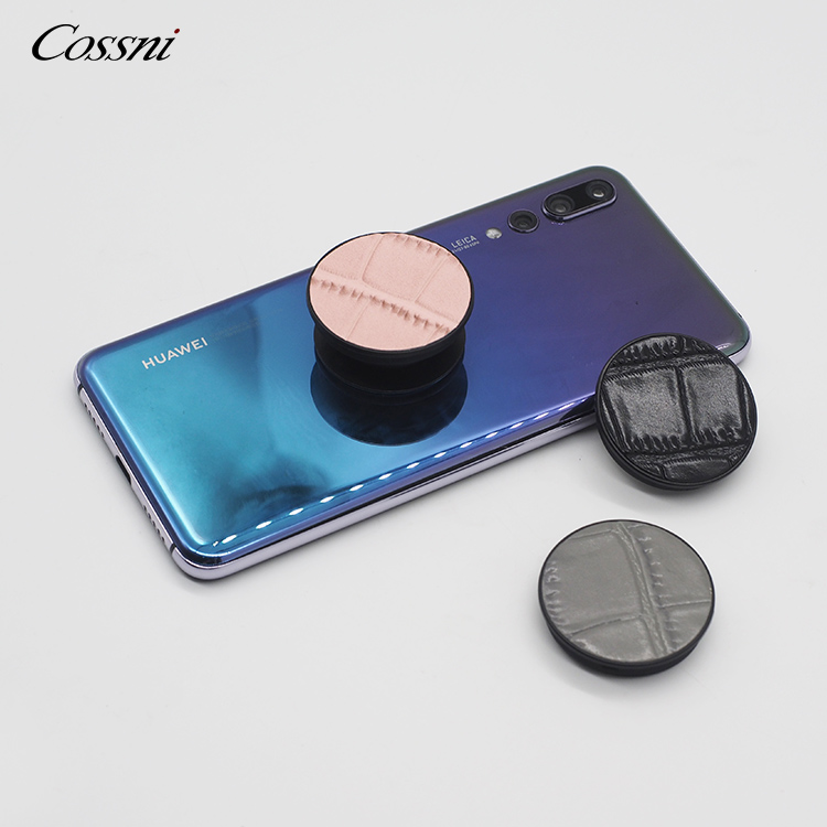 批發定制(zhì)真皮人(rén)氣貼皮迷你(nǐ)手機(jī)彈出支架